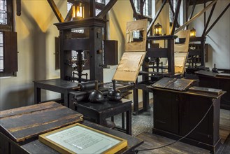 Print shop showing 18th and 17th century printing presses in the Plantin-Moretus Museum