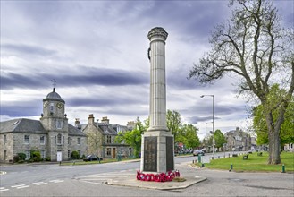Square with War Memorial and clock tower of the Speyside House