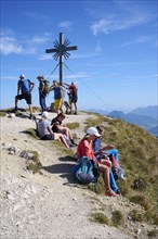 Hiker at the summit of the Grosse Klammspitze