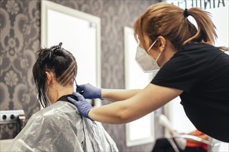Hairdresser with mask