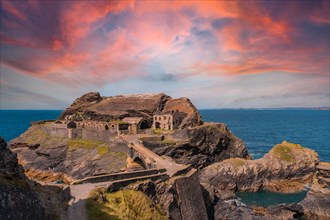 Sunrise at the Fort des Capucins a rocky islet located in the Atlantic Ocean at the foot of the cliff in the town of Roscanvel