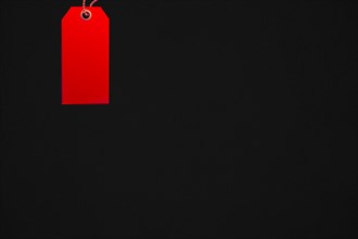 Illustration of red paper tag on black background