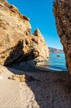 Small coves on Calahonda beach in the town of Nerja