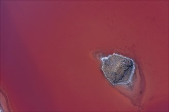 Aerial view of a salt works with salt island