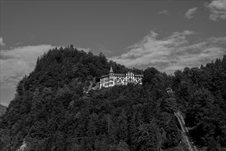 The Historical Grandhotel Giessbach on the Mountain Side in Giessbach
