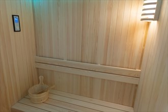 Empty not heated clean wooden finn sauna. Mid shot