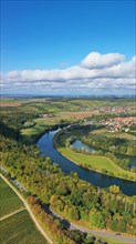 The Mainschleife near Volkach winds through the valley and is surrounded by fields and vineyards. Volkach