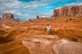 A European photographer at John Ford's Point in Monument Valley. Utah