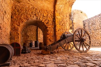 Cannons in the internal tunnel of the wall of the medieval castle of Ibiza