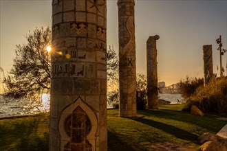 Sunset at the beautiful columns on Avenida de los Marineros in the coastal city of Torrevieja
