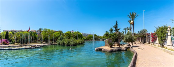 Panoramic view of the beautiful lake in the center of the city in the Parque de las Naciones in the town of Torrevieja