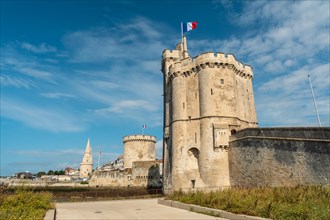 The beautiful fort and Saint Nicolas Tower of La Rochelle in summer. Coastal town in southwestern France