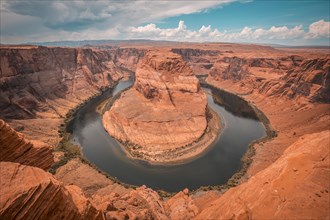 The stunning Horseshoe Bend and the Colorado River in the background with retouching Orange Teal