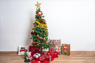 Domestic living room decorated with Christmas tree and Christmas decoration with gifts