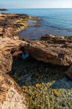 Precious rocks by the sea in the coastal city of Torrevieja
