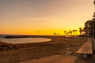 Orange sunset at Playa del Cura in the coastal town of Torrevieja