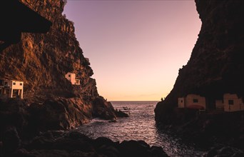 Sunset from inside the cave of the town of Poris de Candelaria on the north-west coast of the island of La Palma