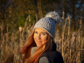 Woman with bobble hat and long hair