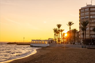 Beautiful sunset at Playa del Cura in the coastal city of Torrevieja