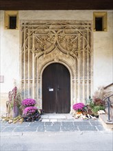 Artful entrance portal. Harvest offerings