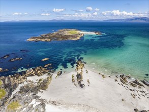 Aerial view of the sandy White Strand of the Monks on the northern part of the Isle of Iona