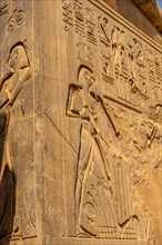 Beautiful facade of one of the most beautiful temples in Egypt. Luxor Temple with its sculptures of pharaohs and the obelisk