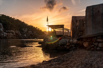 Wooden beach house at sunset in Benirras in Ibiza. vacation concept