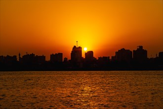 Orange sunset on the Nile river