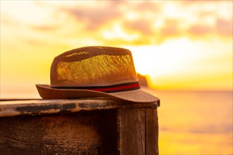 Tourist hat at sunset in Cala Comte beach on the island of Ibiza. Balearic