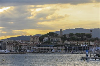 View of the old town and the Palais des Festivals from the Croisette in the evening