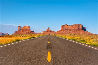 The road with its yellow lines of Monument Valley