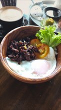 Tapsilog paired with coffee