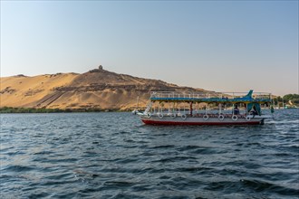 Small towns and ancient temples navigating the Nile River in Aswan city. Egypt
