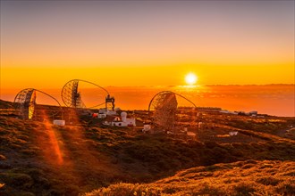 The new astronomical observatory of the Caldera de Taburiente in a beautiful orange sunset