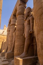 Sculptures of pharaohs in the Egyptian Temple of Luxor and its precious columns. Egypt