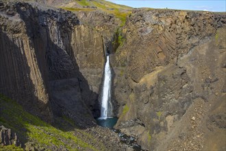 The last waterfall that descends from Hengifoss in Iceland from above