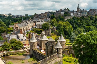 Interior of the castle of Fougeres and the city in the background. Brittany region