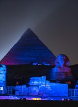 Sound and light show at the beautiful pyramids and sphinx of Giza. Night in the city of Cairo. Africa