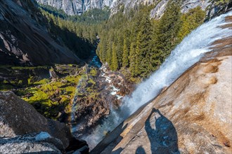 The strong water that comes down from the Vernal Falls waterfall. California