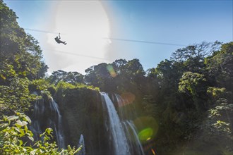 The giant Pulhapanzak waterfall in Lake Yojoa. Honduras