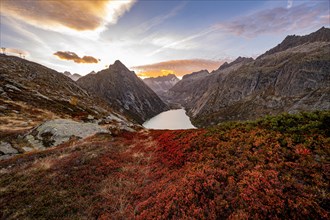 Autumn atmosphere at Lake Grimsel in the Swiss Alps with Zinggenstock