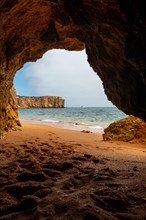 Natural cave in the Algarve on the beach at Praia da Coelha