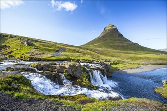 The famous Icelandic mountain Kirkjufell and the small waterfalls