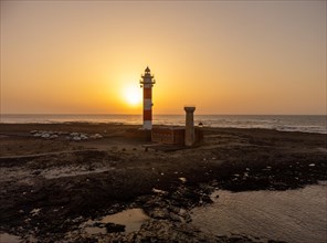 Aerial view of the Toston Lighthouse at sunset