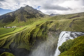 Water fall at the top of Skogafoss waterfall in the golden circle of south of Iceland