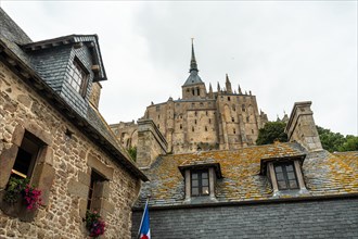 Old wooden dwellings at the famous Mont Saint-Michel Abbey in the Manche department