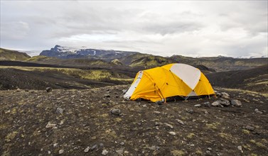 A yellow tent at the Landmannalaugar refuge for trekking. Iceland