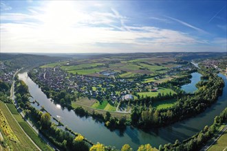 The river loop near Homburg am Main winds through the valley and is surrounded by trees and vineyards. Homburg