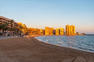 Beautiful sunset at Playa del Cura in the coastal city of Torrevieja