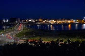 Night shot of the harbour with bridge in Hvide Sande